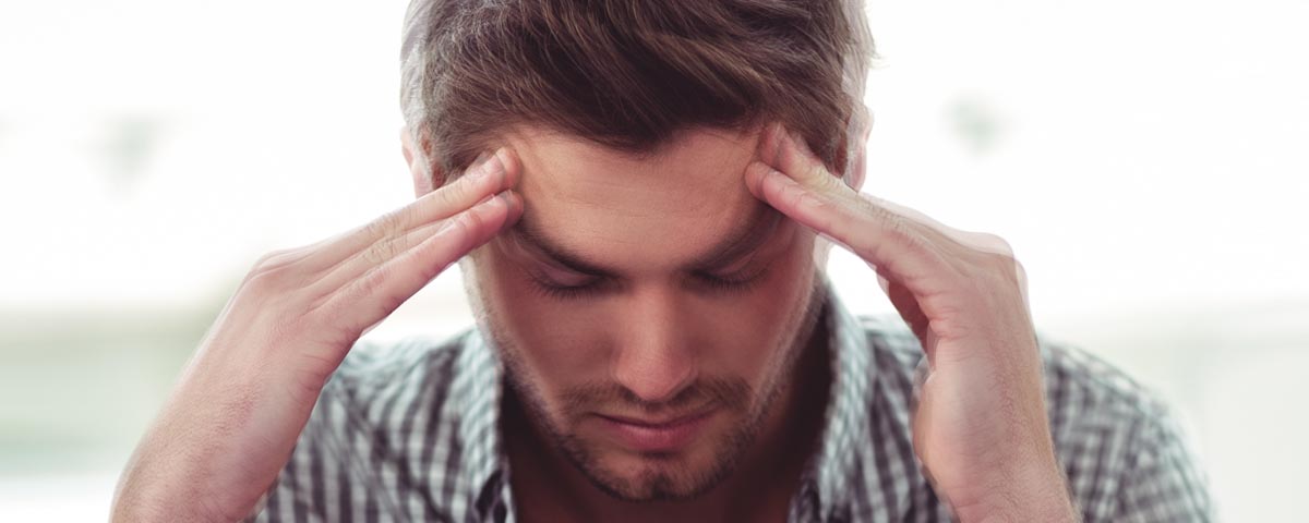Man suffering from migraine associated vertigo