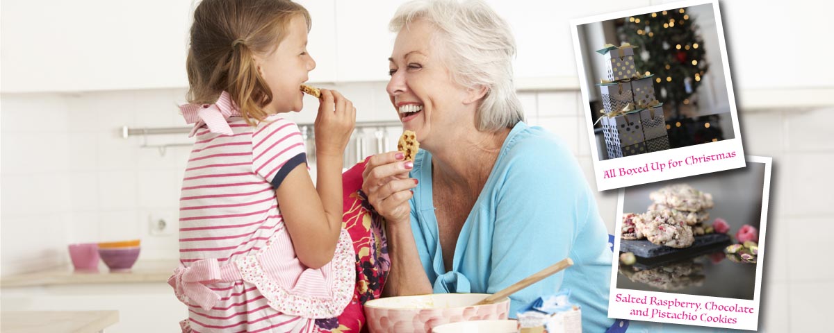 Grandmother and granddaughter baking cookies together